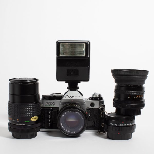 Canon AE-1 Program with 28mm, 50mm, and 135mm Lenses and Flash on Sale